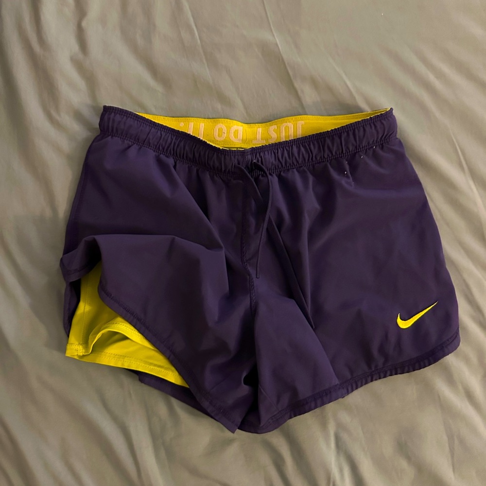 Nike dry fit shorts. Size small. Purple and yellow/green